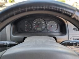 
										Mazda 323 full									