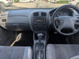 
										Mazda 323 full									