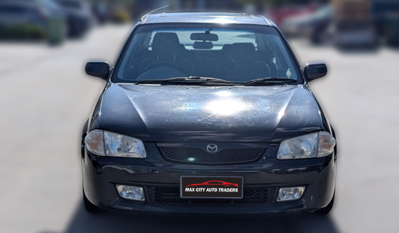 
								Mazda 323 full									